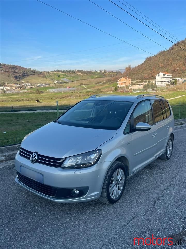 2013' Volkswagen Touran photo #1