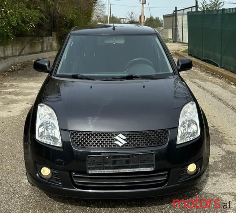 2009' Suzuki Swift photo #1