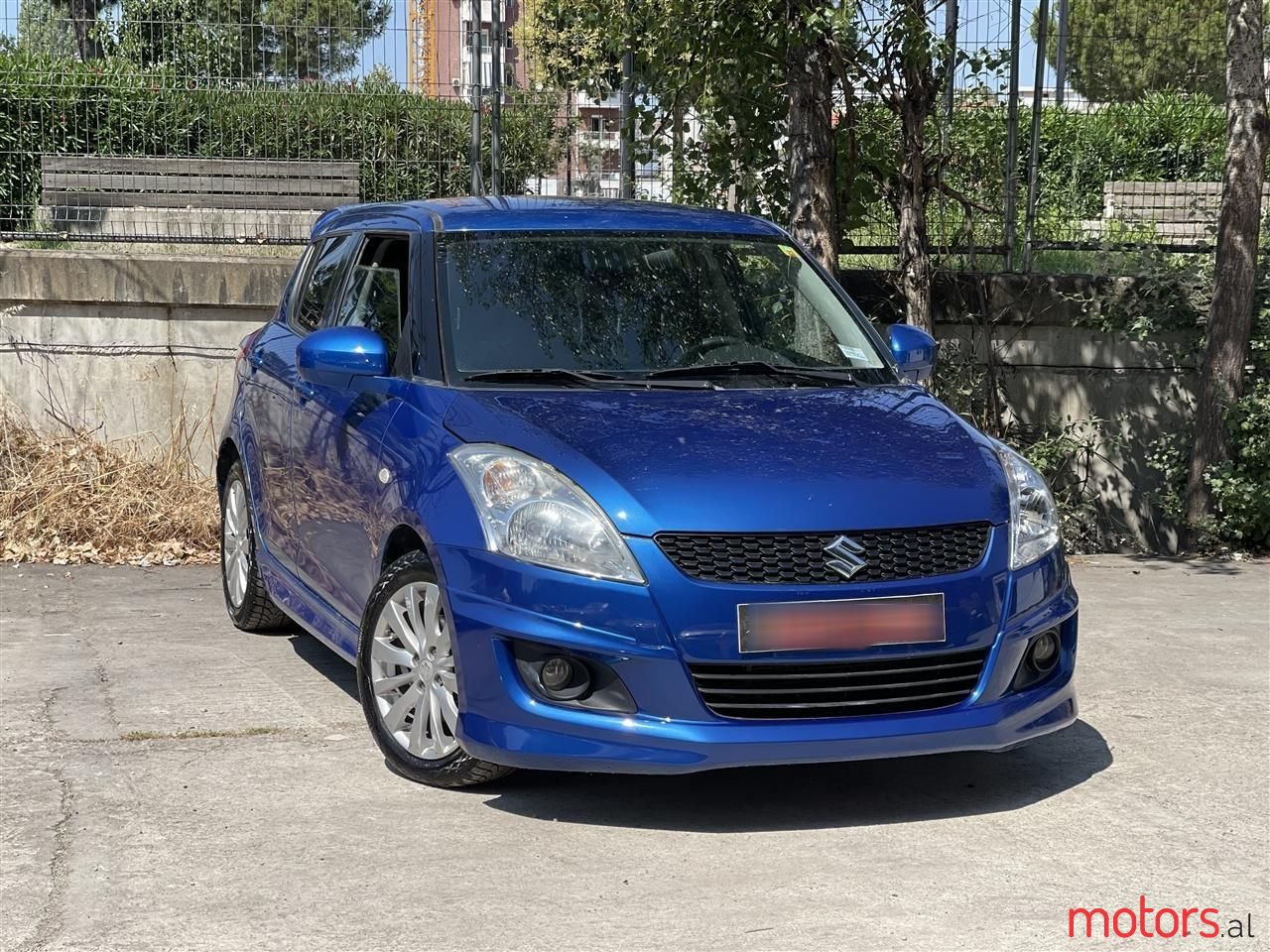 2011' Suzuki Swift photo #1