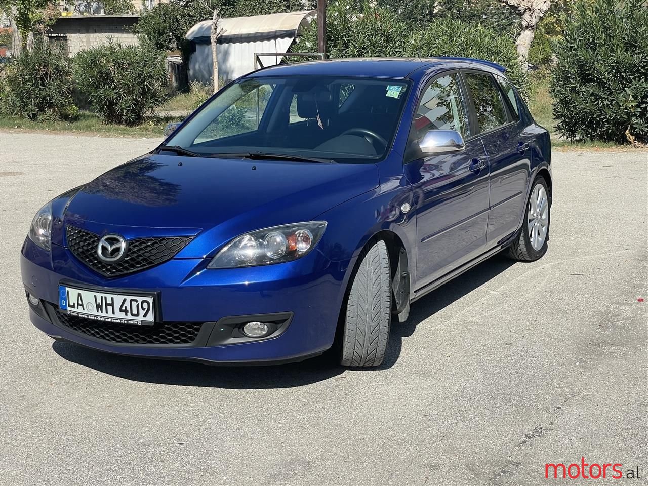 2006' Mazda 3 photo #1