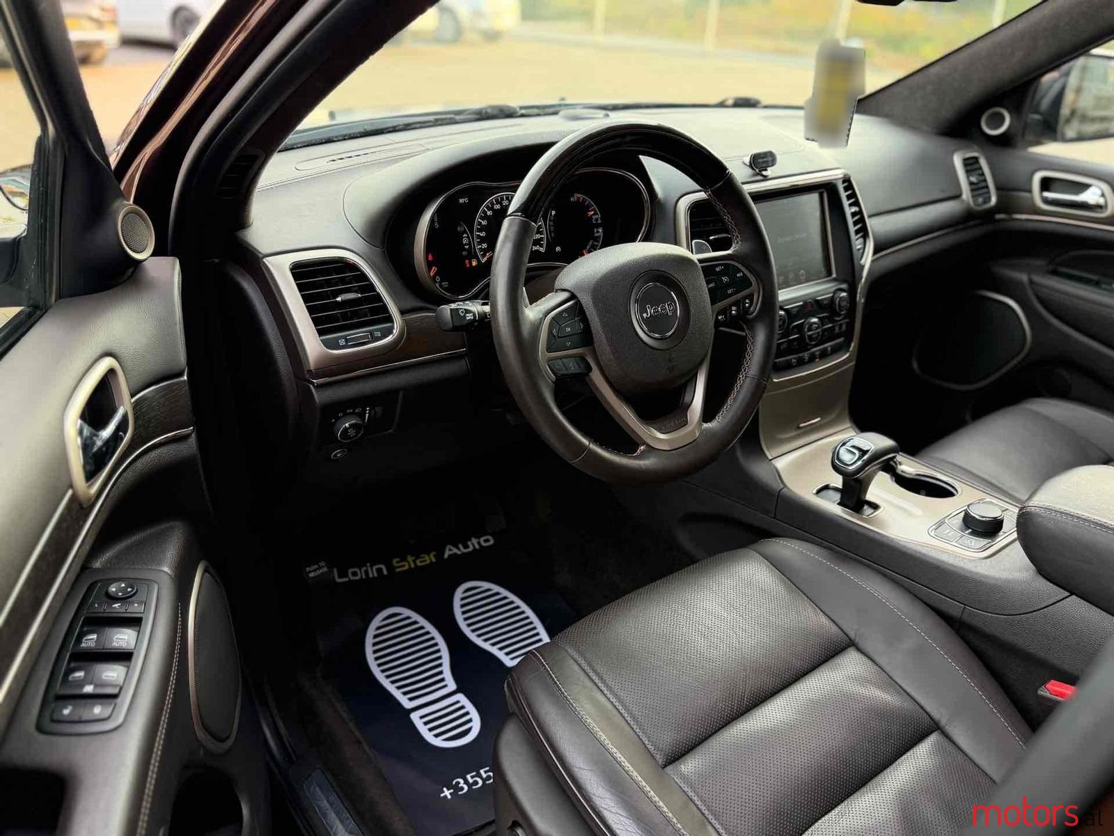 2014' Jeep Grand Cherokee photo #5