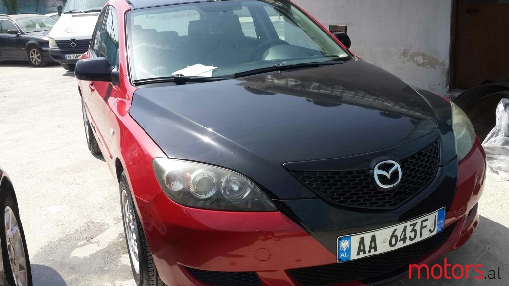 2004' Mazda 3 photo #1