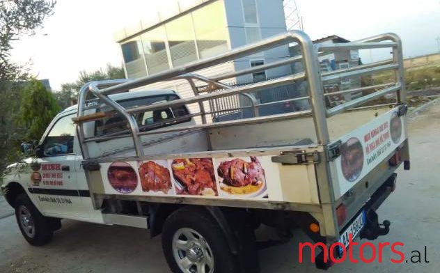 2010' Mitsubishi L200 photo #1