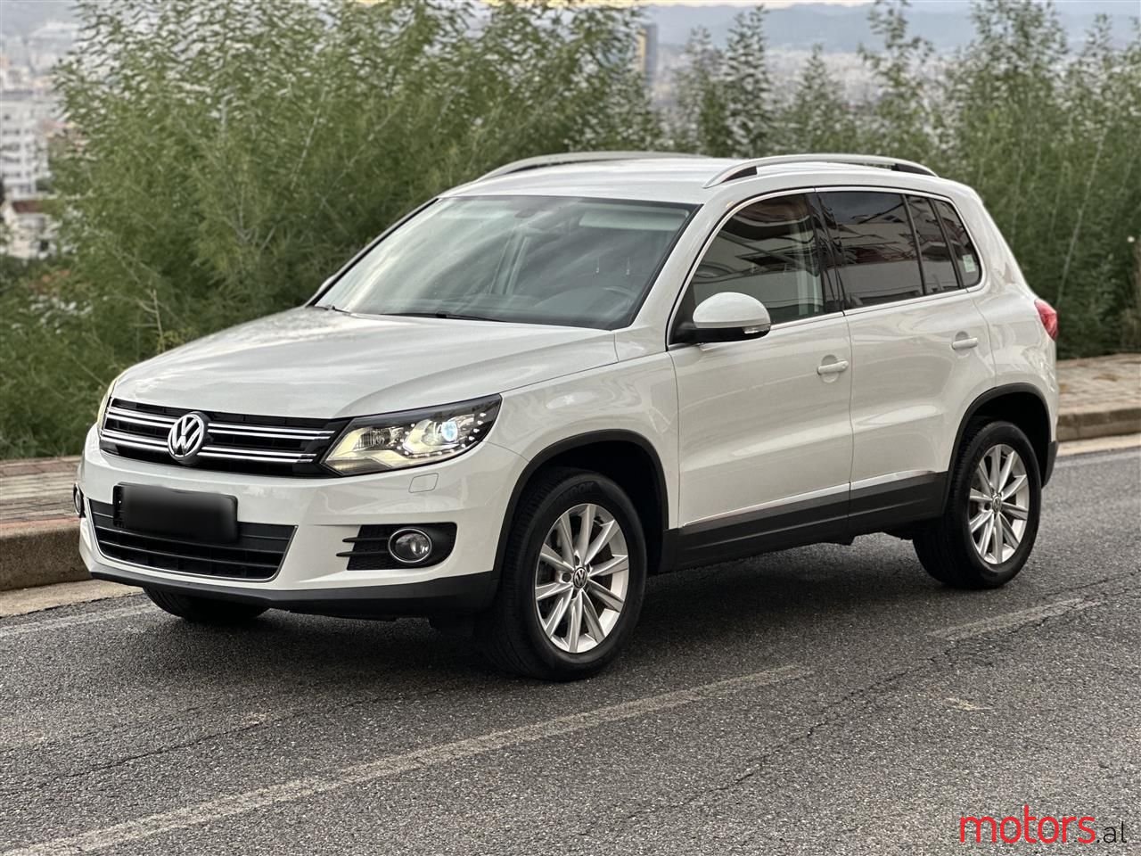 2014' Volkswagen Touran photo #3