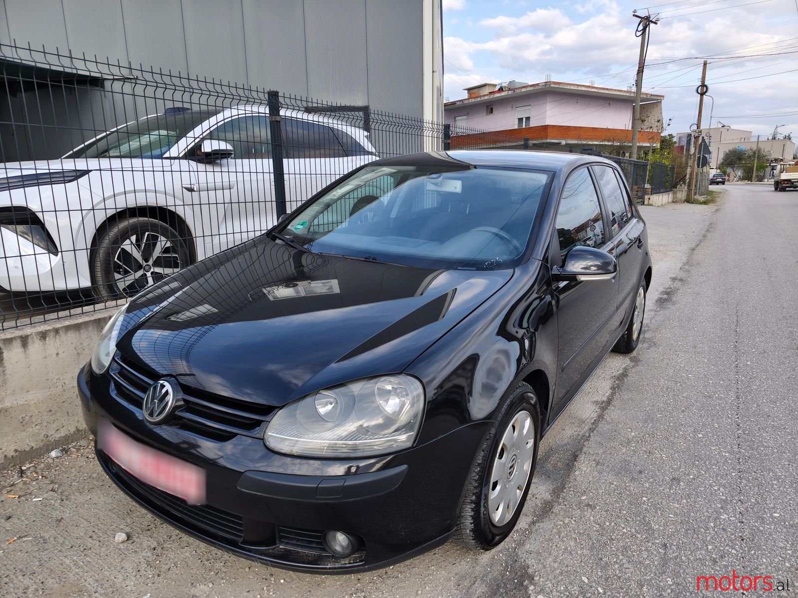 2004' Volkswagen Golf photo #1