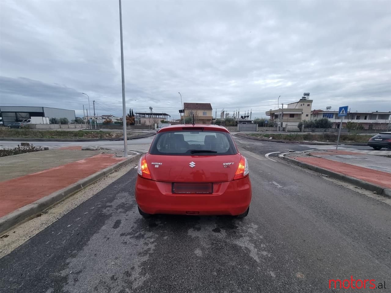 2010' Suzuki Swift photo #2