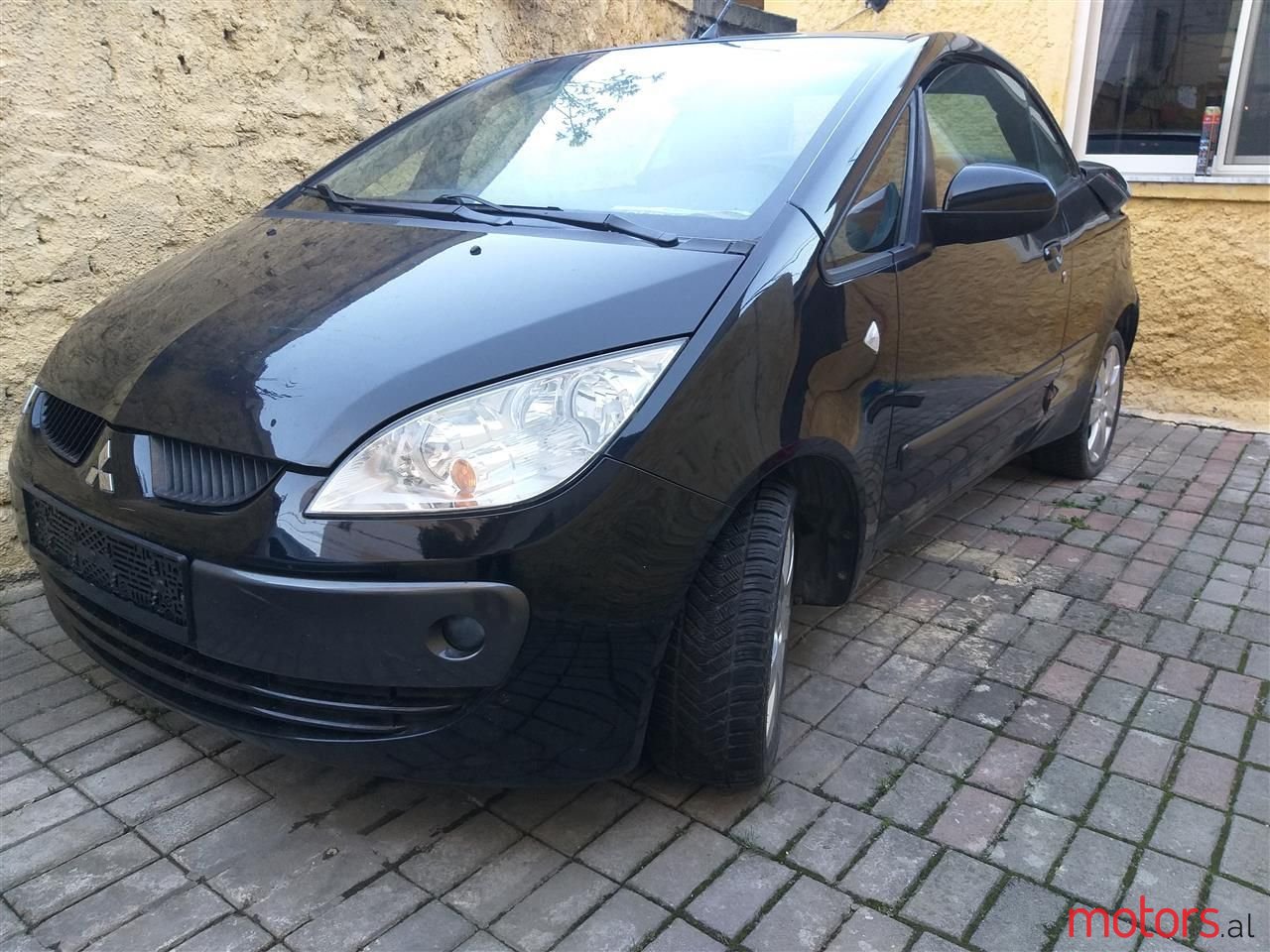 2008' Mitsubishi Colt photo #1