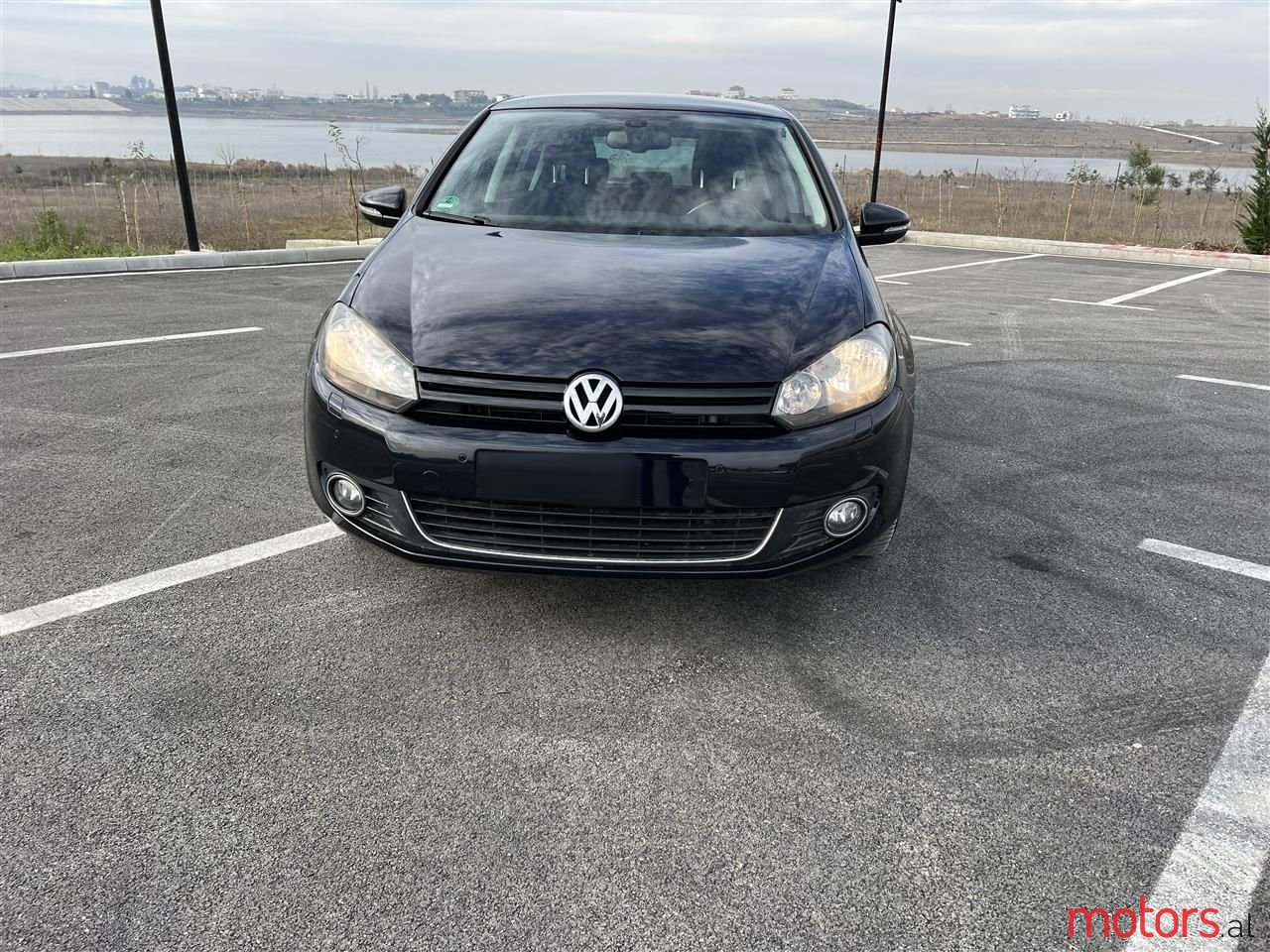 2011' Volkswagen Golf photo #1