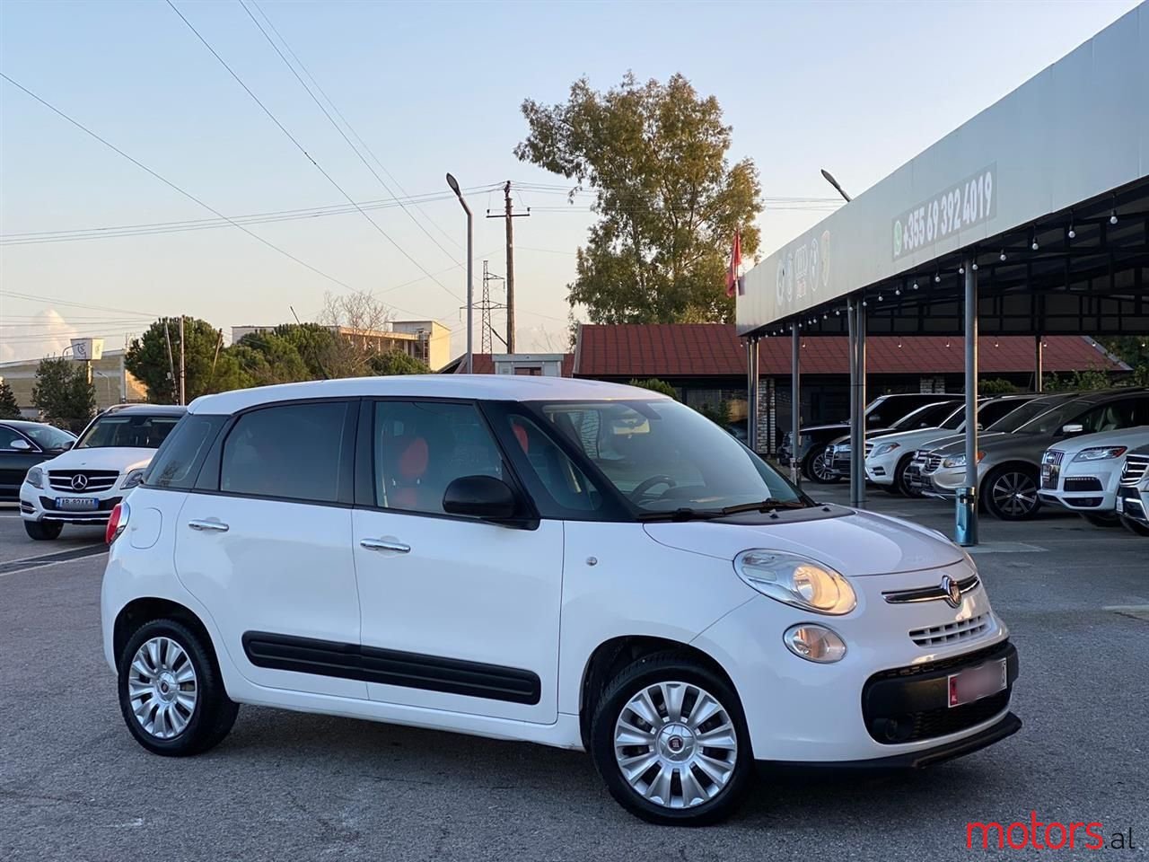 2013' Fiat 500L photo #1
