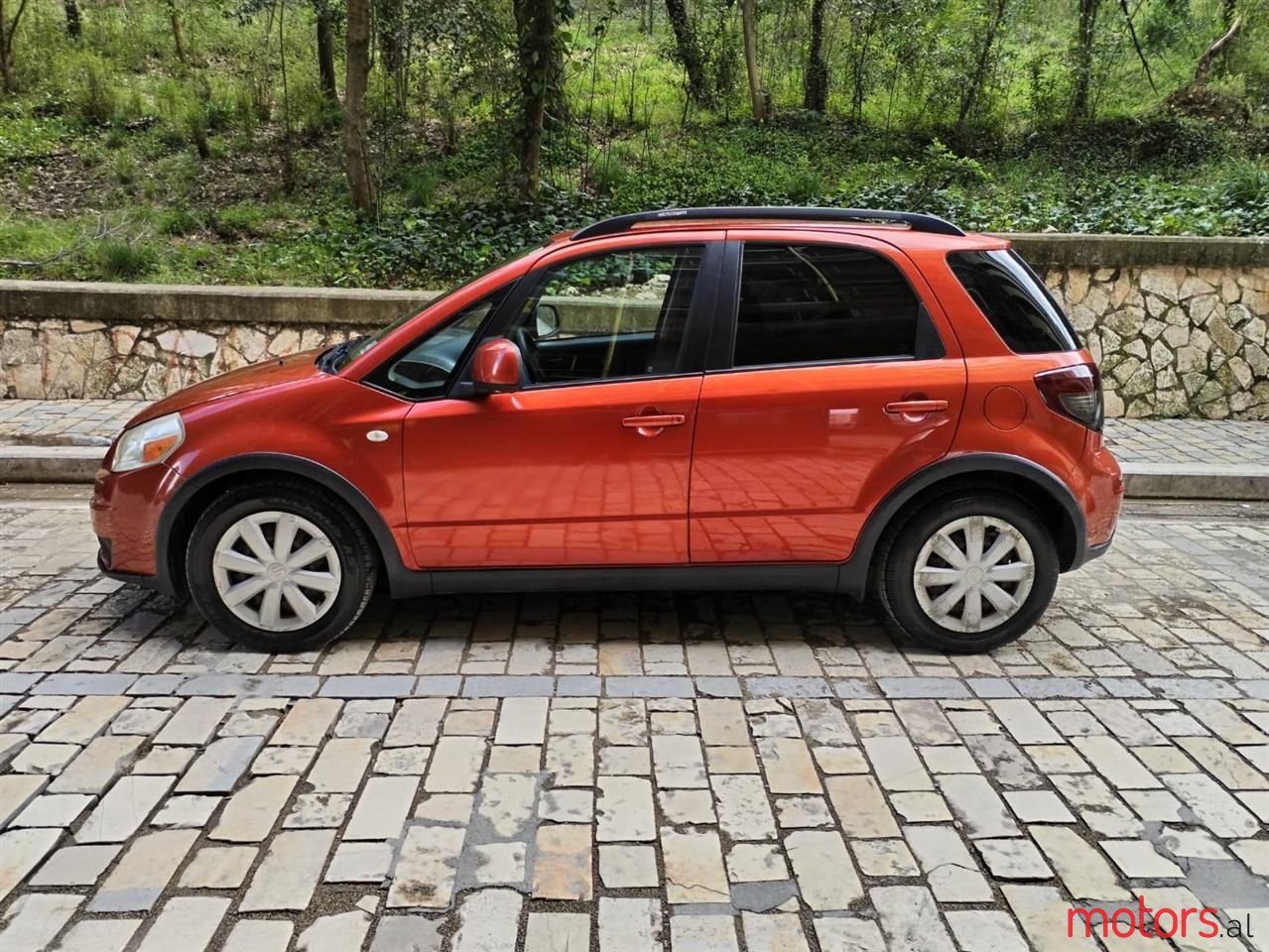 2010' Suzuki SX4 photo #1