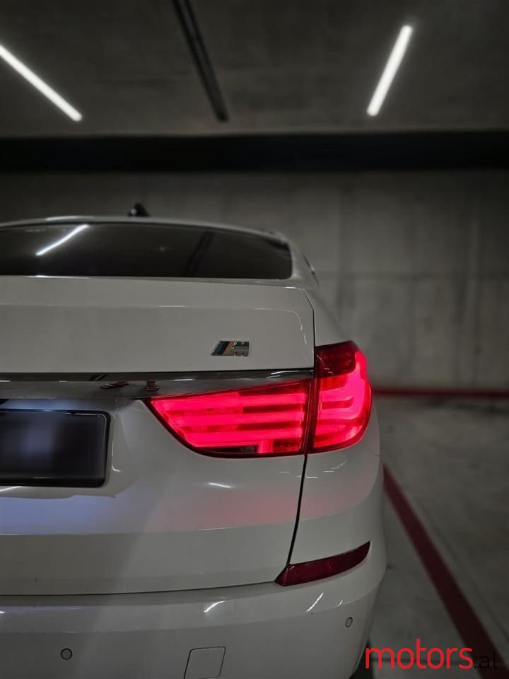 2012' BMW 520 photo #6