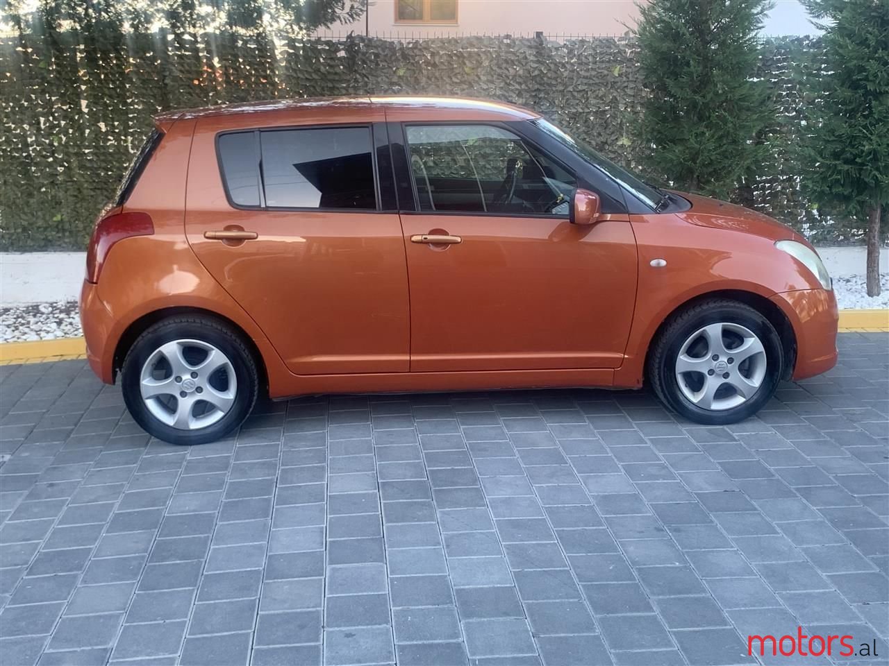 2006' Suzuki Swift photo #1