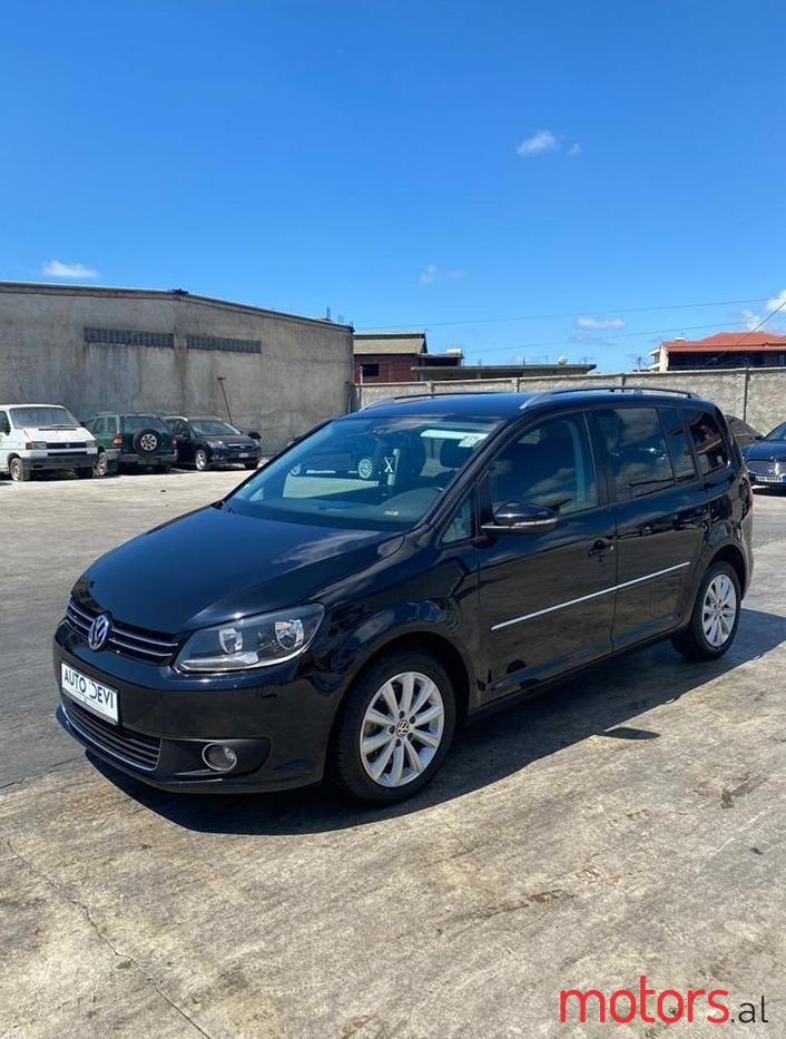 2012' Volkswagen Touran photo #1
