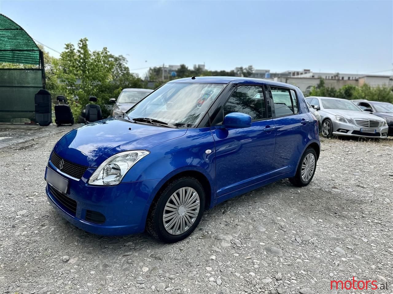 2006' Suzuki Swift photo #2