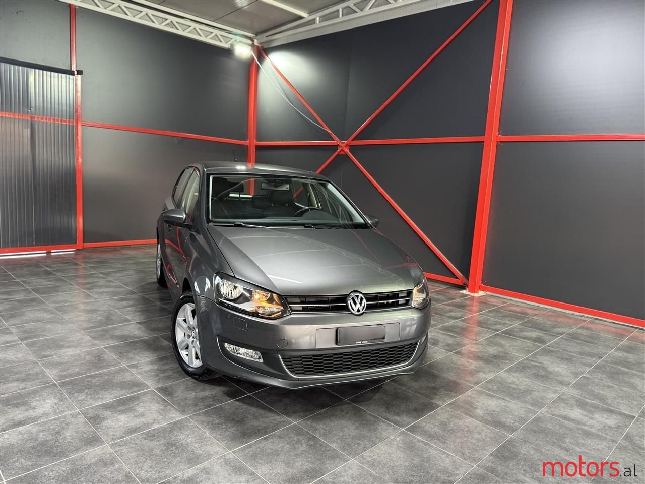 2011' Volkswagen Polo photo #1