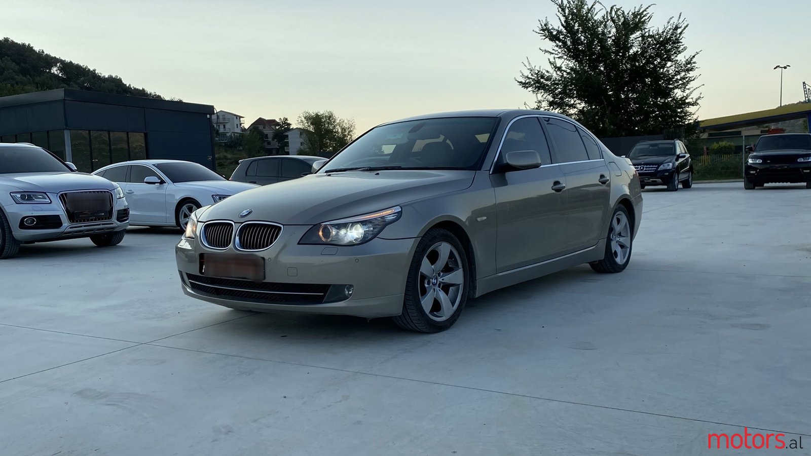 2009' BMW 528 photo #1