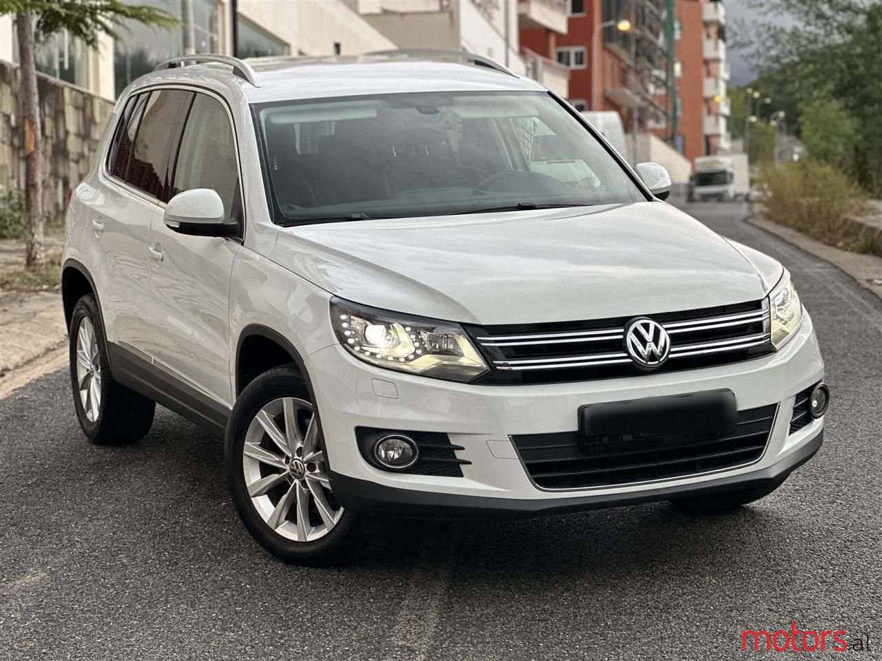 2014' Volkswagen Touran photo #1