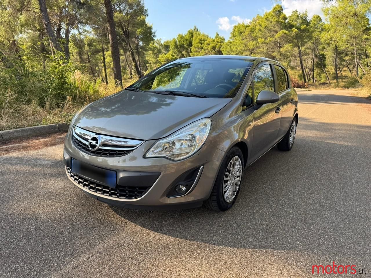 2011' Opel Corsa photo #2