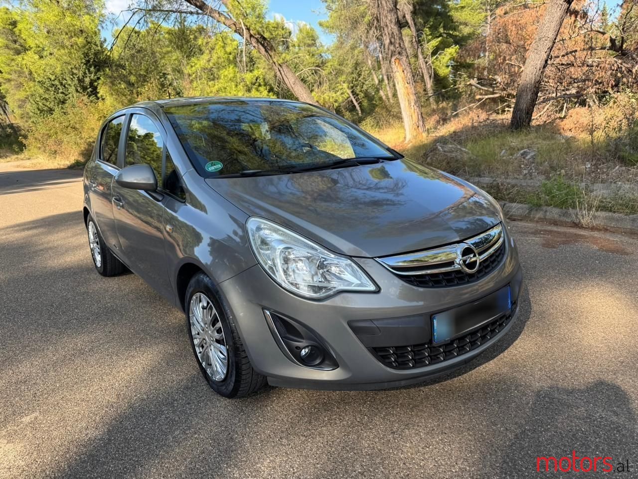 2011' Opel Corsa photo #1